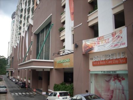 Front entrance of 10 Semantan with ground-floor shops